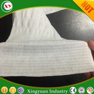 Small ear nonwoven for baby nappy